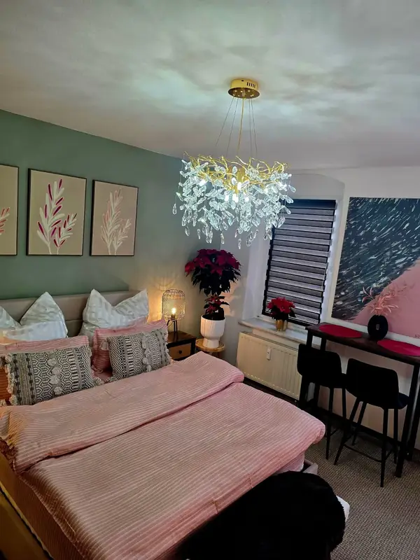Bed and bar table by the window